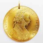 Lotto 97885 Ciondolo (medaglia forata) in oro giallo con scritte FRANC IOS I D G AUSTRIAE IMPERATOR e UNGAR BOHEM GAL (4) LOD LLL REX A A 1915 Base d'asta: da definire - Cauzione: da definire